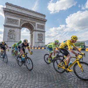Chris Froome, wearing the leader's yellow jersey in front of Arc de Triomphe during the Tour de Fran